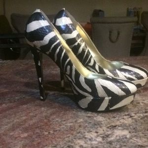 Bebe heels,,5 inches, excellent condition